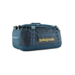 Patagonia Black Hole Duffel 40L - 100% Postconsumer Recycled Polyester -Sportswear Shop black hole duffel 40l 100 postconsumer recycled polyester bags patagonia tidal teal 263306
