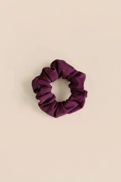 The Scrunchie - Made From Recycled Water Bottles -Sportswear Shop the scrunchie made from recycled water bottles headband girlfriend collective plum 666400
